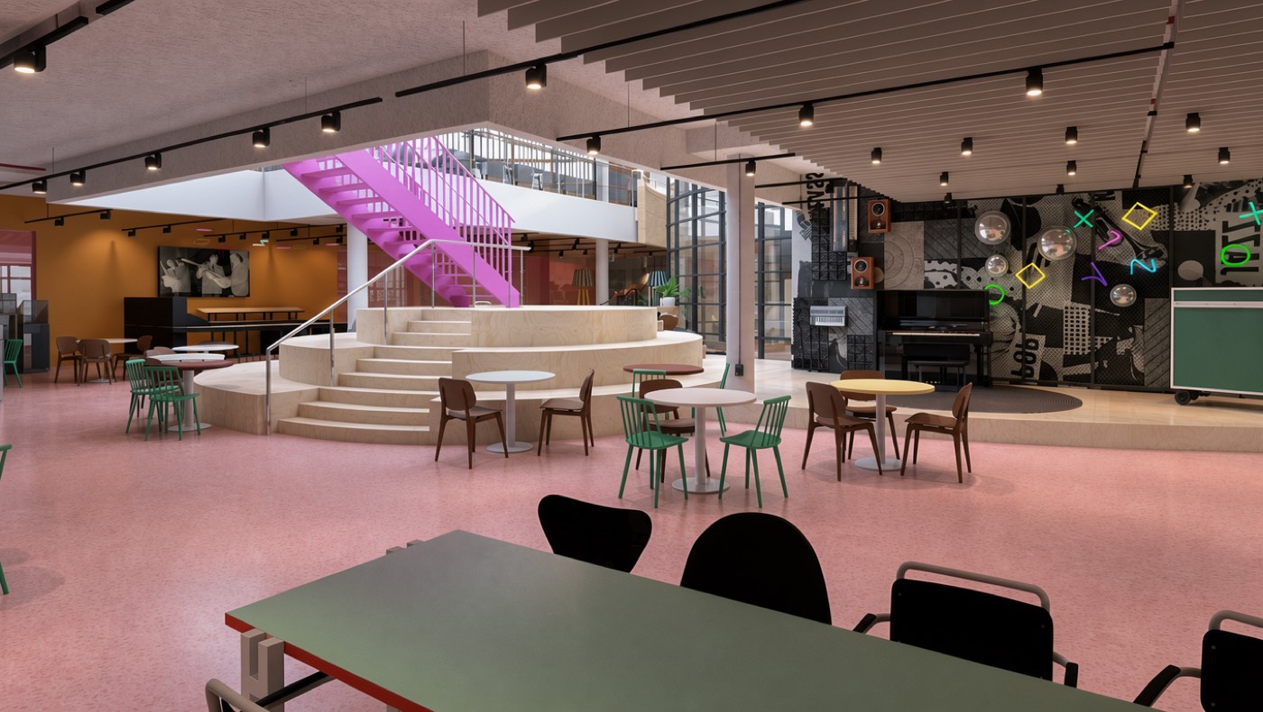 Het open atrium is het hart van Fonos, met een trap die alle verdiepingen verbindt.